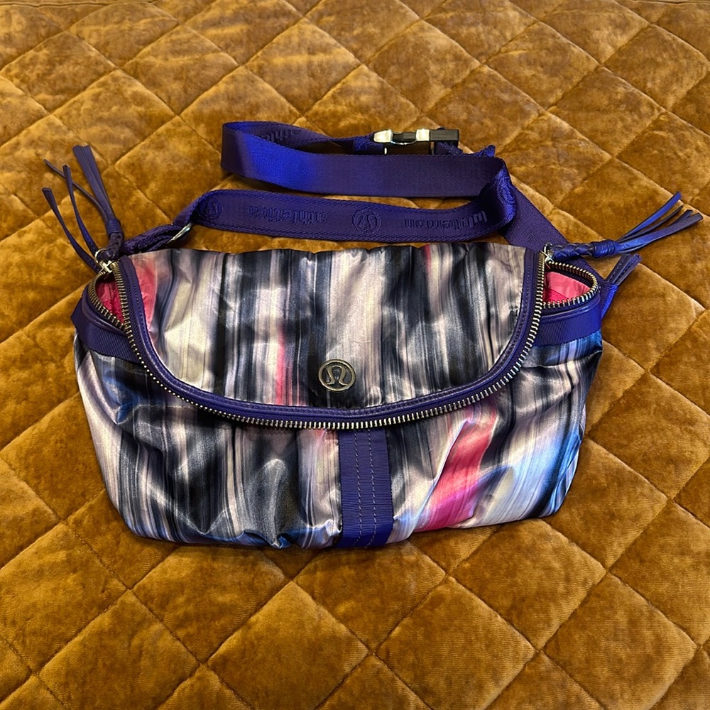 NWT purple Lululemon waist Fanny crossbody bag. Adjustable buckle strap